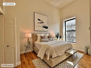 215 E 118th St in New York, NY - Building Photo - Building Photo