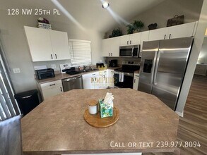 128 NW 25th Pl in Cape Coral, FL - Building Photo - Building Photo