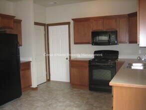 7851 Holyoke Loop in Coeur d'Alene, ID - Building Photo - Building Photo