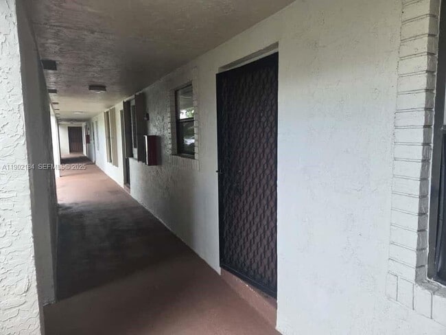 property at 7406 Woodmont Terrace