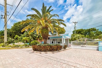 98202 Windward Ave, Unit Unit 202 and Boatslip in Key Largo, FL - Building Photo - Building Photo