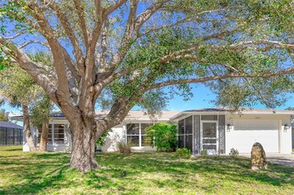 241 Caddy Rd in Rotonda West, FL - Foto de edificio - Building Photo