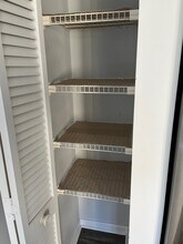 3930 SW Greenwood Way, Unit Clubhouse Ct #4F in Palm City, FL - Building Photo - Building Photo