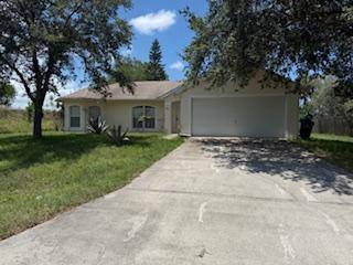 949 Serenade St NW in Palm Bay, FL - Foto de edificio