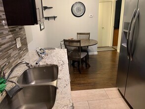 10211 Ura Ln, Unit 2-206 in Thornton, CO - Foto de edificio - Building Photo