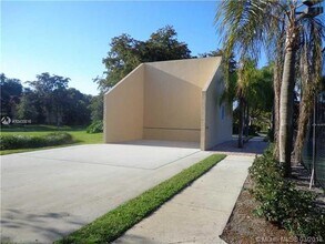 911 Lyons Rd, Unit 2202 in Coconut Creek, FL - Building Photo - Building Photo