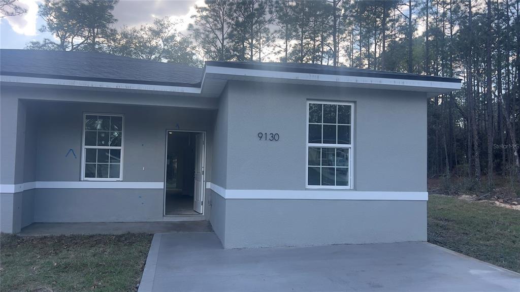 9130 N Mendoza Way in Citrus Springs, FL - Building Photo