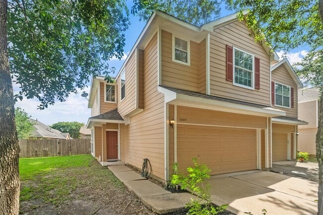 property at 12411 Saratoga Woods Ln