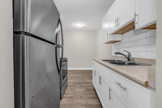 Gatensbury Apartments in Coquitlam, BC - Building Photo - Building Photo