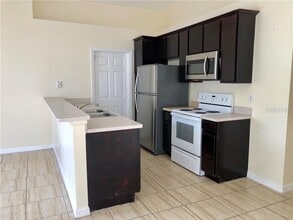 7698 Pine Fork Dr in Orlando, FL - Building Photo - Building Photo