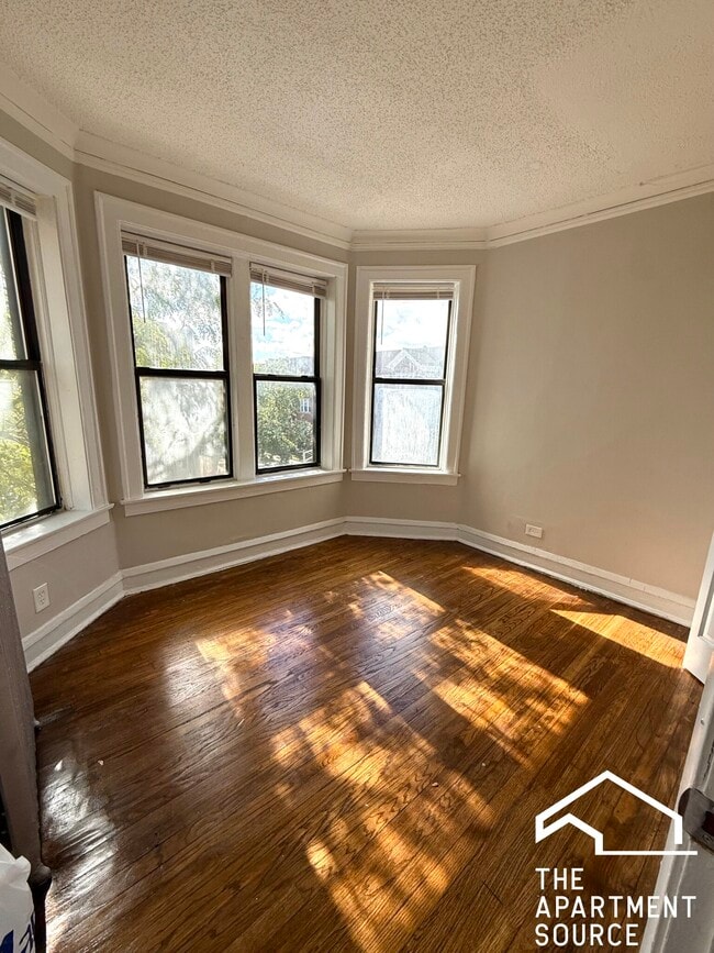 property at 6959 S Paxton Ave