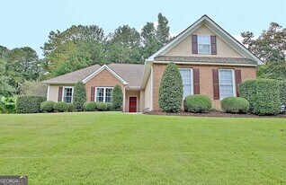 21 Wellington Mnr Dr, Unit 202 in Sharpsburg, GA - Building Photo