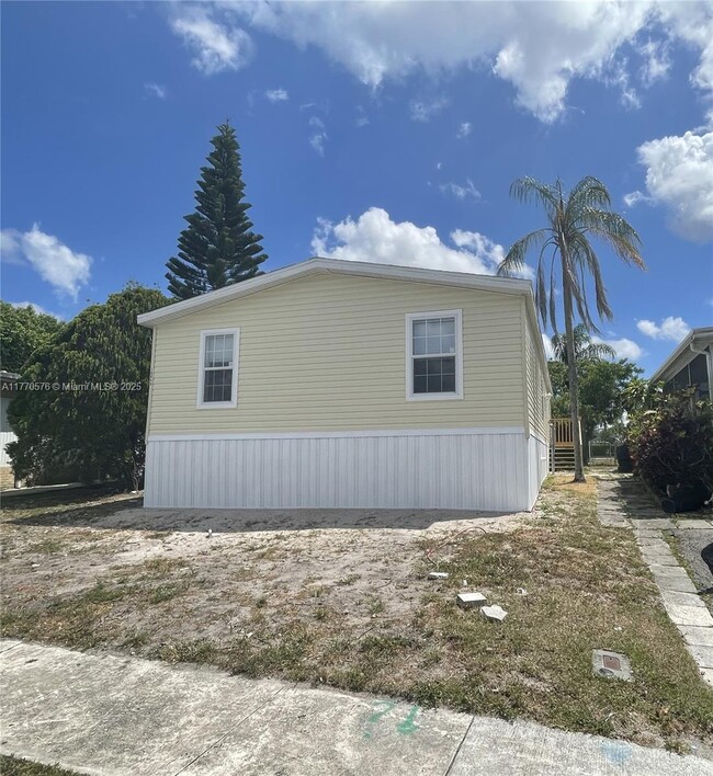 property at 10304 SW Sandalfoot Blvd