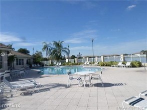 5061 Wiles Rd in Coconut Creek, FL - Building Photo - Building Photo