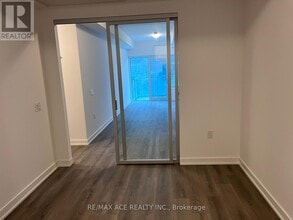 7439 Kingston Rd in Toronto, ON - Building Photo - Building Photo