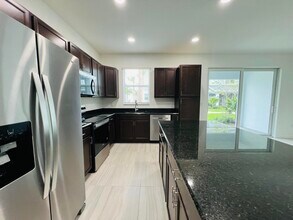 16411 Powerscourt Dr in Westlake, FL - Building Photo - Building Photo