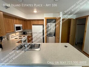 9748 Island Estates Pl-Unit -Apt 106 in Minocqua, WI - Building Photo - Building Photo