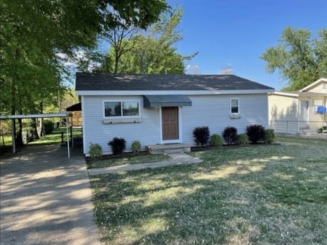 property at 213 E Wells Blvd