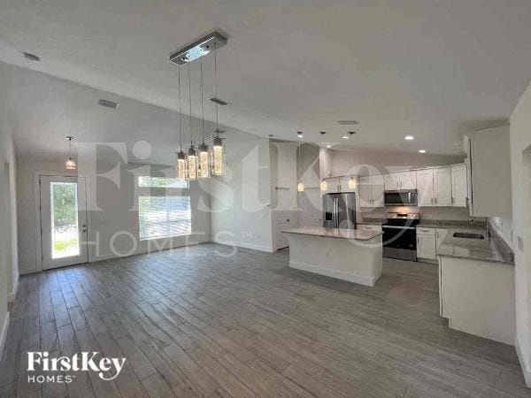 7411 Wycliff Dr in Port Charlotte, FL - Building Photo - Building Photo
