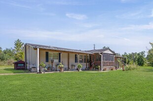 806 Co Rd 2112 in Liberty, TX - Building Photo