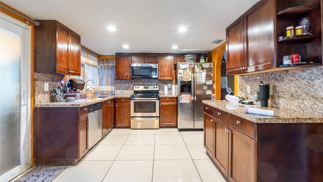 property at 6624 NW 1st Ct