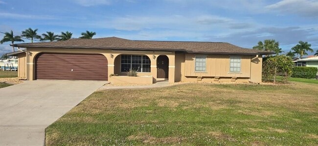 110 Sinclair St SE in Port Charlotte, FL - Building Photo - Building Photo