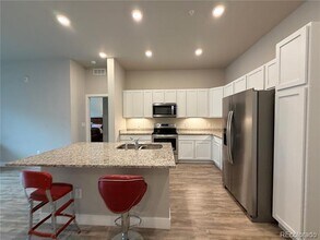 14341 E Tennessee Ave in Aurora, CO - Building Photo - Building Photo