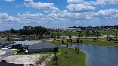 2440 BOWLING Ter in Okahumpka, FL - Building Photo - Building Photo