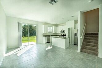 7472 Stone Crk Trl in Kissimmee, FL - Building Photo - Building Photo