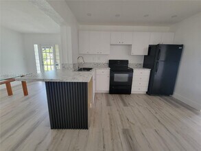 7303 NW 57th Pl in Tamarac, FL - Building Photo - Building Photo