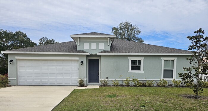 5 Pierce Ln in Palm Coast, FL - Foto de edificio