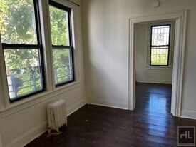 3BR 1BA Sunny Corner Duplex w/ backyard in Brooklyn, NY - Building Photo