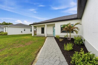 12542 Mohican Ave in Port Charlotte, FL - Building Photo - Building Photo