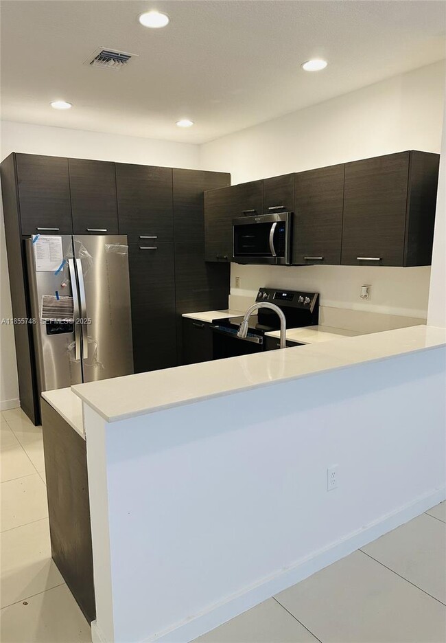 property at 3442 NW 13th St