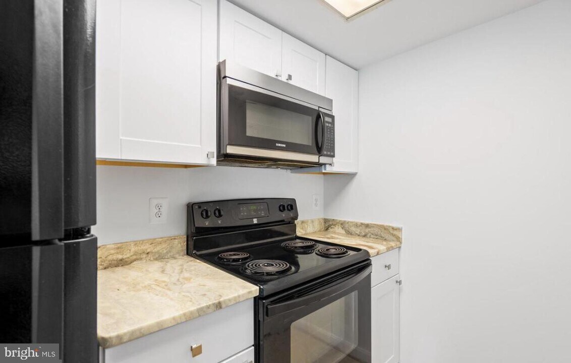 1013 Summerglenn Ct-Unit -7-203 in Bowie, MD - Building Photo