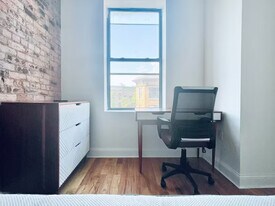 Central AC, washer/dryer, Exposed Brick Room #214, Unit 3 in Queens, NY - Building Photo