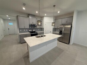 1165 Lakeshore Breeze Pl in Kissimmee, FL - Foto de edificio - Building Photo