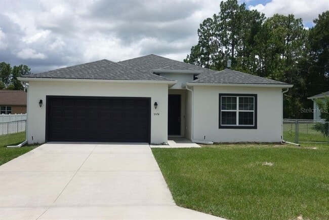 property at 5574 SW 128th Pl
