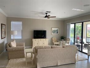 15148 Palmer Lake Cir-Unit -201 in Naples, FL - Building Photo - Building Photo