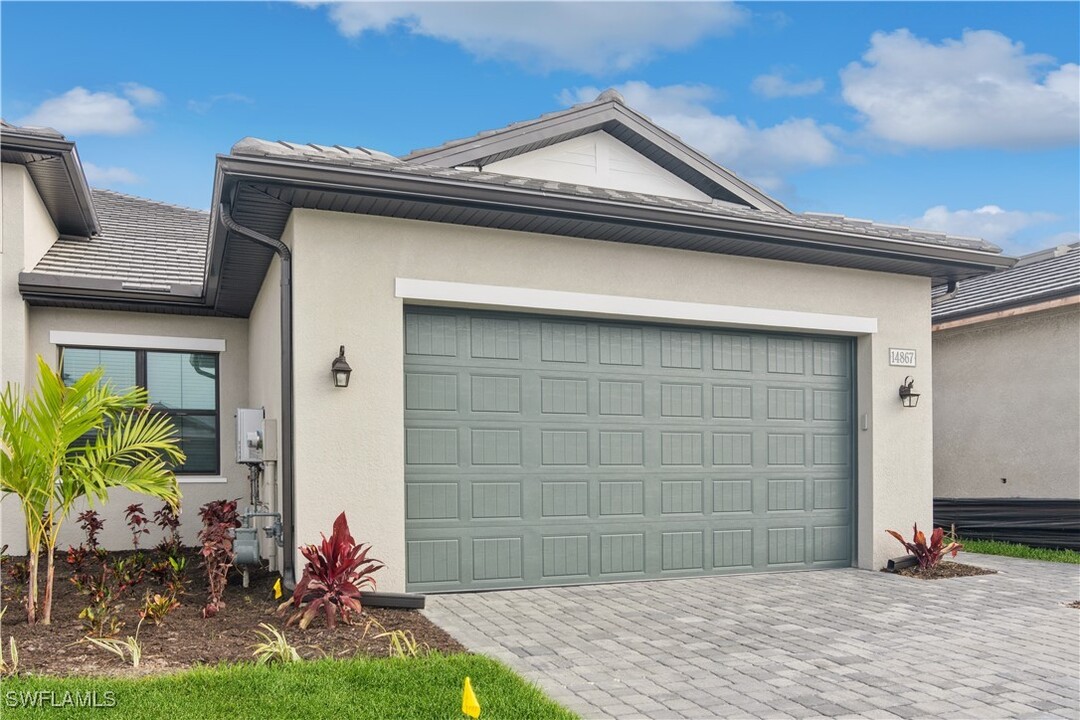 14867 Loggerhead Dr in Naples, FL - Building Photo
