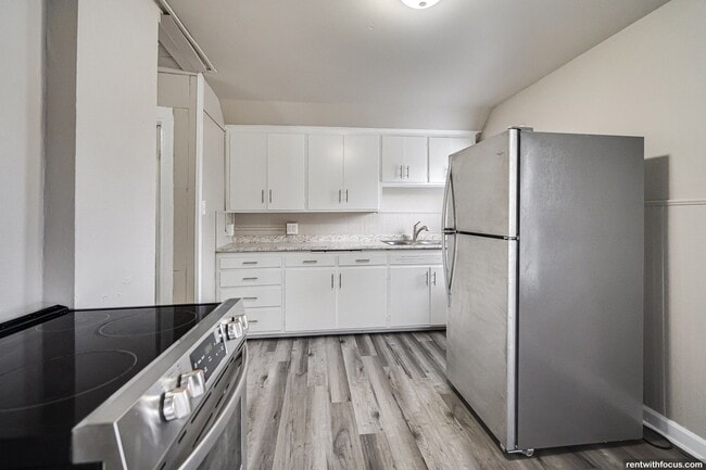 property at 218 E 8th St