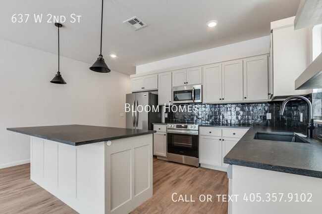 property at 637 W 2nd St