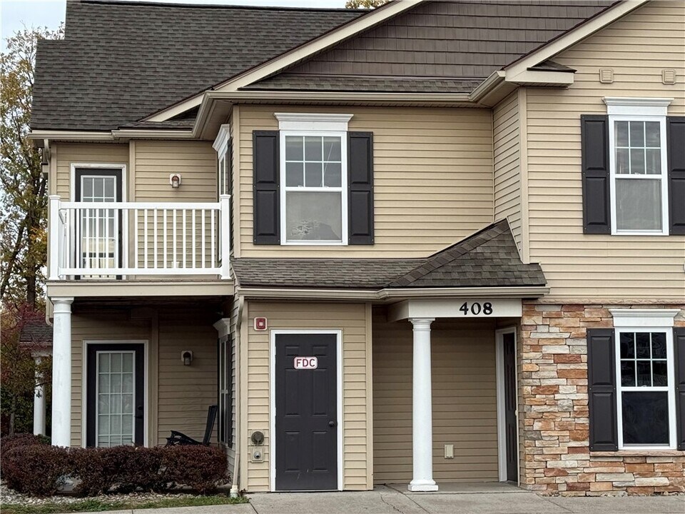 1260 Lehigh Station Rd in Henrietta, NY - Building Photo