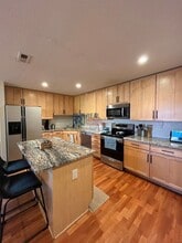 9895 W Freiburg Dr in Littleton, CO - Building Photo - Building Photo