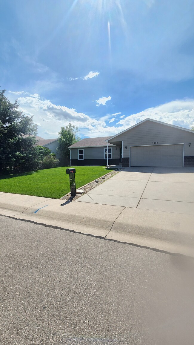 3209 Collins Ave in Evans, CO - Building Photo - Building Photo