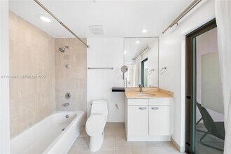 7700 Collins Ave in Miami Beach, FL - Building Photo - Building Photo