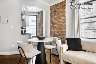 232 Elizabeth St in New York, NY - Building Photo - Building Photo