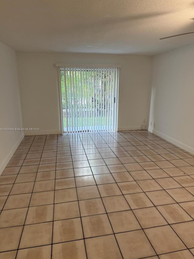 9203 NW 38th Dr in Coral Springs, FL - Building Photo - Building Photo
