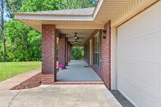 7134 Snug Waters Rd in Navarre, FL - Building Photo - Building Photo