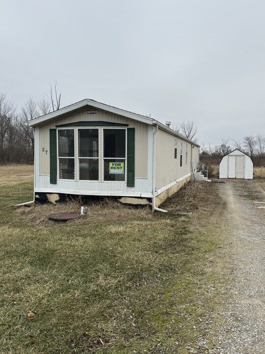 6387 S Napoleon Rd in Harrod, OH - Building Photo